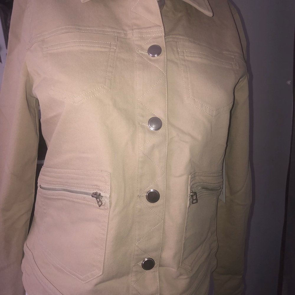 Cropped cream colored utility jacket. Brand new. Size small.